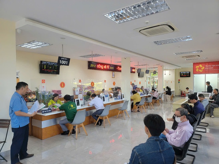 Khẩn trương đưa Trung tâm hành chính công TP.HCM và 38 chi nhánh hoạt động từ 31-7 - Ảnh 1.