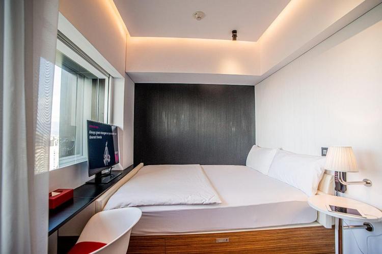 Đồng chí Nguyễn Văn Được, Ủy viên Trung ương Đảng, Phó Bí thư Thành ủy, Chủ tịch UBND TPHCM trình bày tham luận. Ảnh: VIẾT CHUNG
