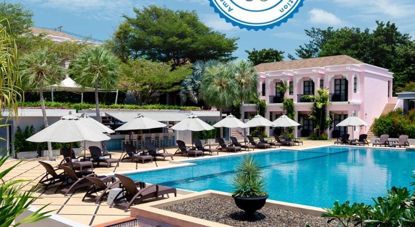 Hoa kèn hồng nở rộ giữa trung tâm TP.HCM, nhuộm hồng đường Hàm Nghi - Ảnh 1.